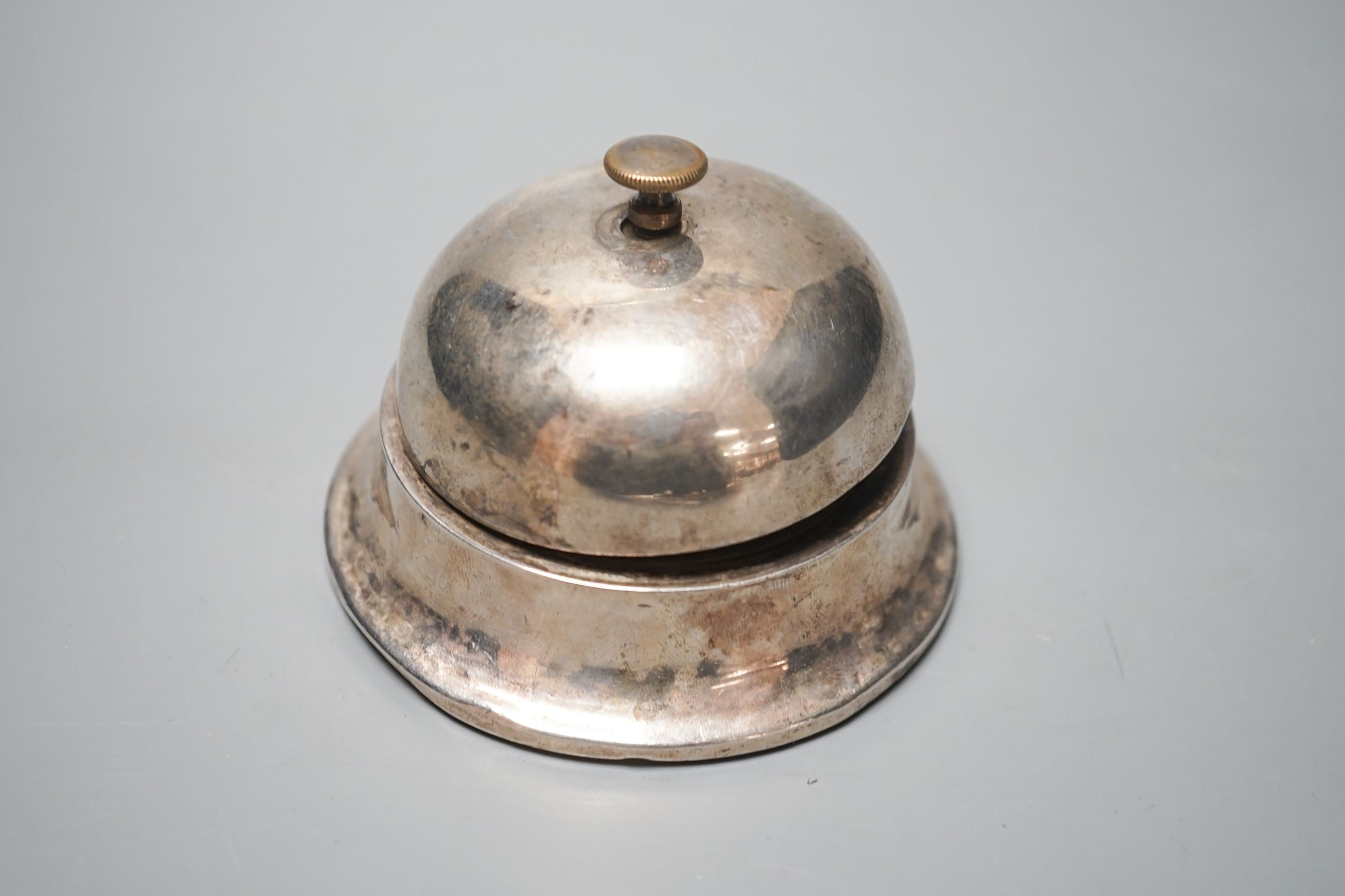 A George V silver mounted table bell, Birmingham, 1914, 88mm.